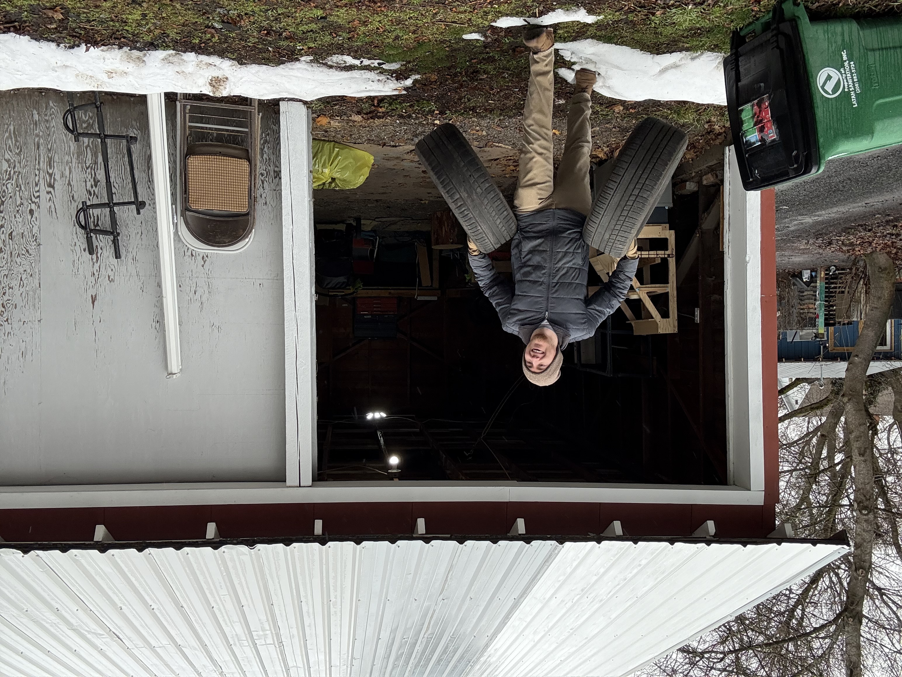 Moscow Junk Removal team carrying tires